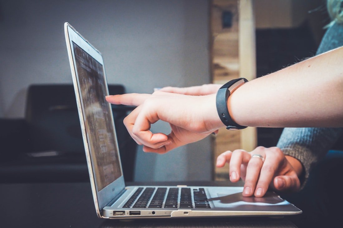 Two people collaborating on a digital product.